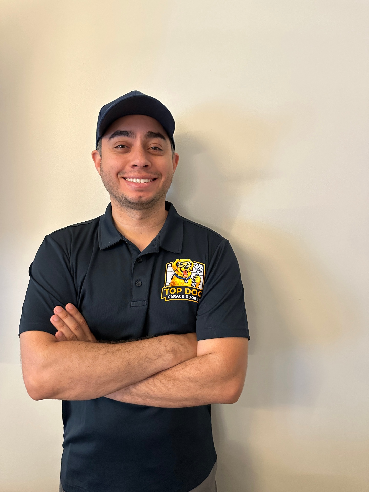 Emmanuel — Top Dog Garage Doors Founder & Owner | Decatur & Metro Atlanta GA Emmanuel — Founder and lead garage door technician at Top Dog Garage Doors serving Metro Atlanta GA