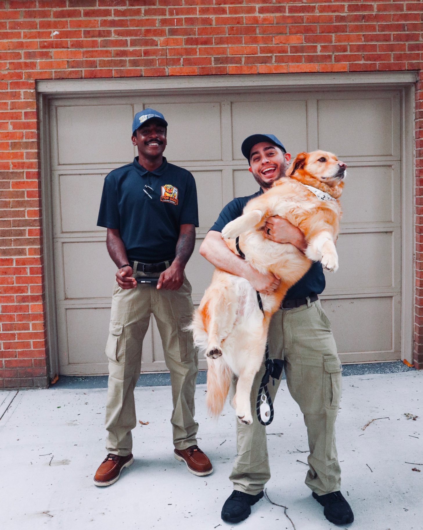 Top Dog Garage Doors technicians at a customer's home in Decatur, GA